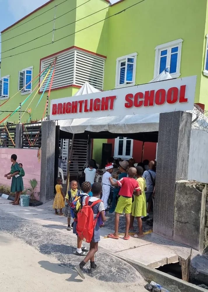 Brightlight International School entrance with pupils