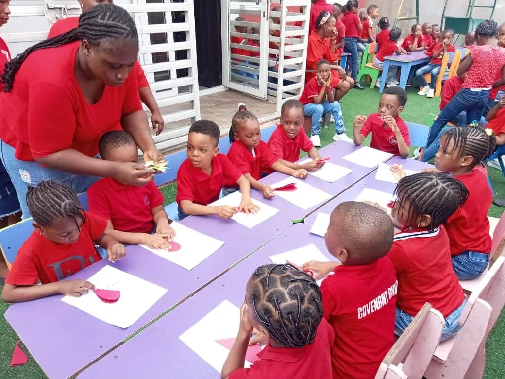 Pupils participating in a classroom learning activity